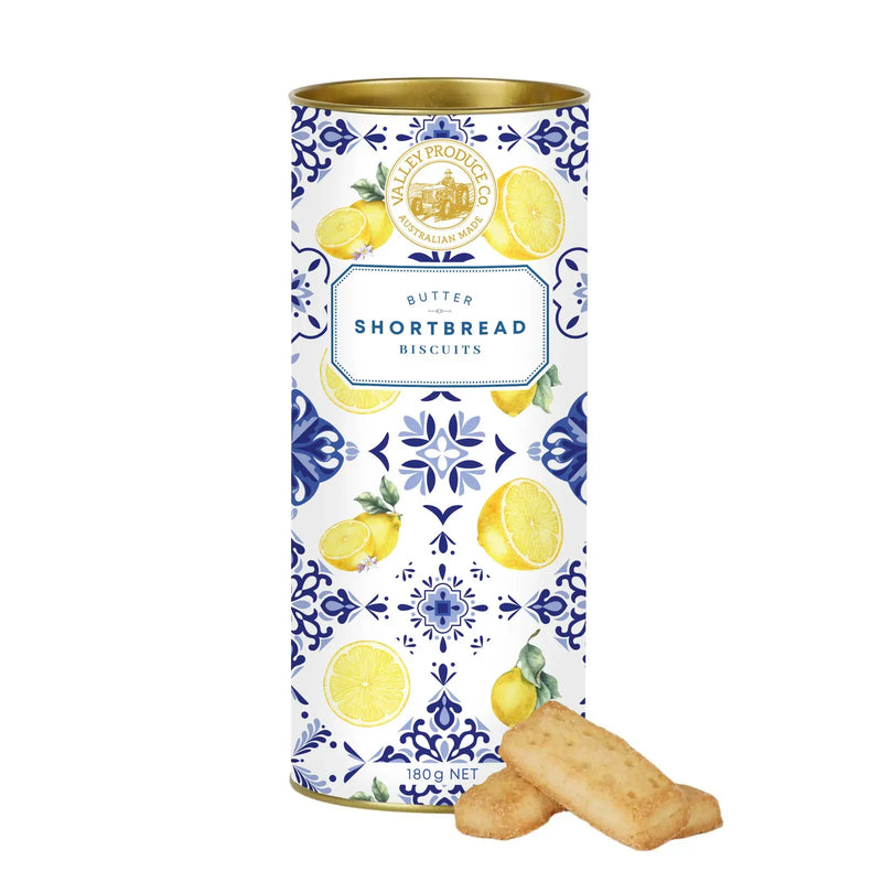 Tall cookie tin with blue lemon pattern; shortbread biscuits shown