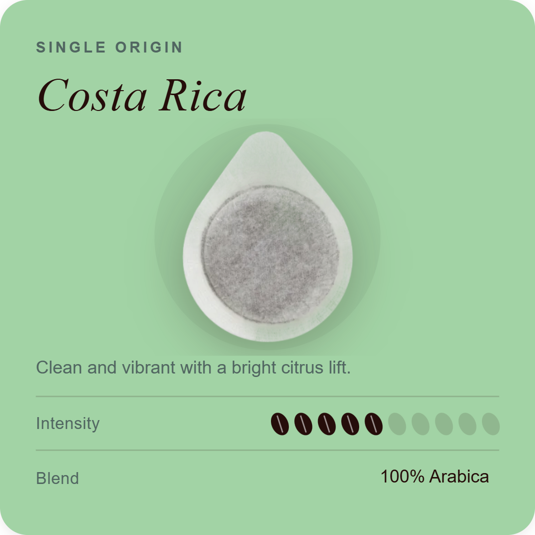 Single-serve coffee pod with Costa Rica label, dark coffee granules on top