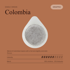 Single coffee pod with circular center filter, wrapped in a white teardrop sleeve