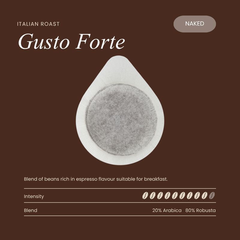 Unwrapped teardrop coffee pod with light white filter and gray grounds center.