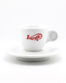 White Lucaffe cup and saucer, red emblem; stack-ready 2-piece set.