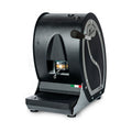 Black pod coffee machine with side door, drip tray, and dispensing spout