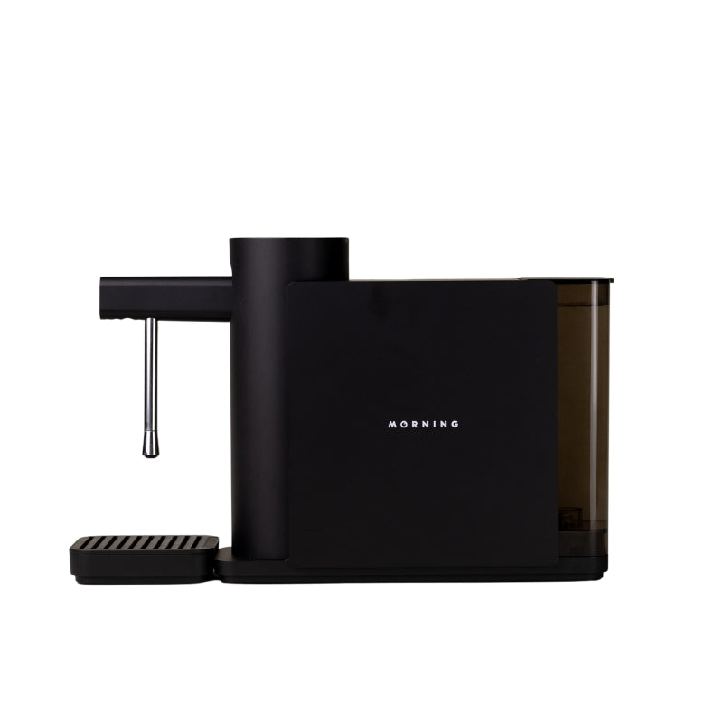 Smart milk steamer, black side view with stainless wand and ridged drip tray