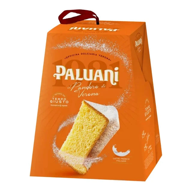Pandoro pastry cake in orange gift box, with powdered cake slice on front