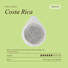 Wrapped single-origin coffee pod with gray coffee filter disc Costa Rica