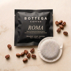 Roma coffee pod with coffee beans and black foil coffee pack