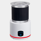 White automatic milk frother with clear lid and blue LED control buttons