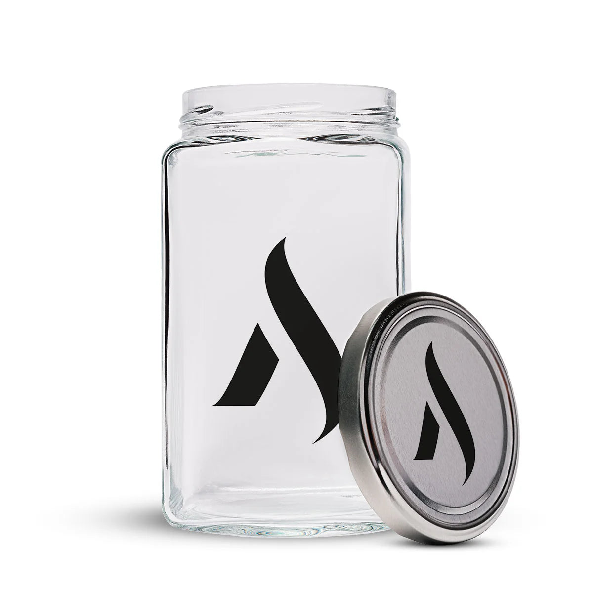 IXELLE glass jar with front flame logo and silver screw-top lid