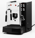 Black and stainless steel pod coffee machine with two spouts and controls