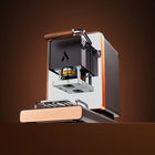 Black ESE coffee pod machine with raised brew head, pod holder, and spout