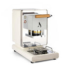 White coffee pod machine with wooden handle, front brew chamber, and metal drip tray