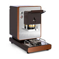 Dark brown coffee pod machine with wooden handle, front brew chamber, and drip tray