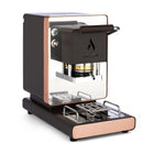 Black ESE coffee pod machine with open brew head and drip tray, rose-gold accents