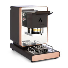 Black ESE coffee pod machine with open brew head and drip tray, rose-gold accents