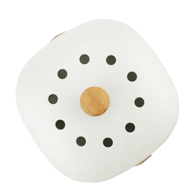 White compost bin lid with round perforations and wooden knob handle